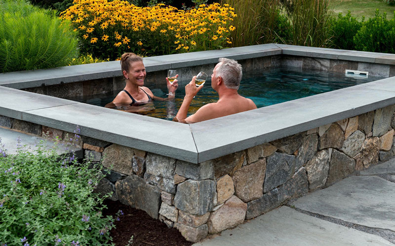 Couple Enjoying a Soake Hot Tub